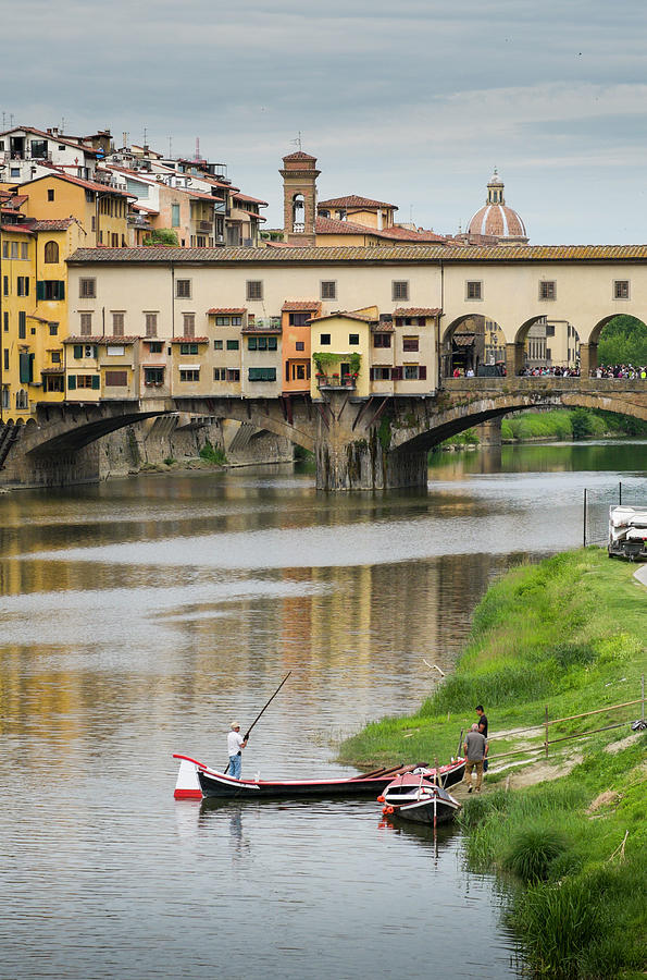 Man with a pole on a punt boat Florence Photograph by David L Moore