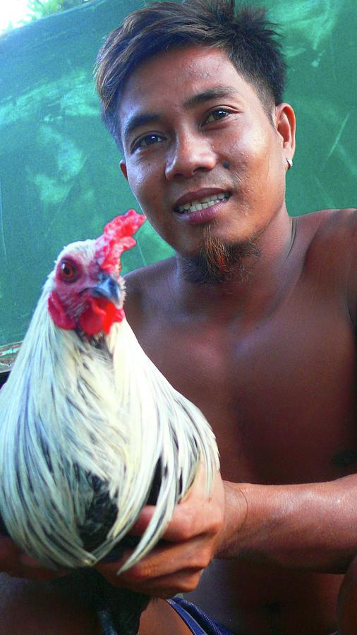 Man with rooster Photograph by Robert Bociaga