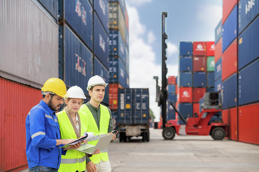 Manager standing in container depo company area Photograph by Anek ...