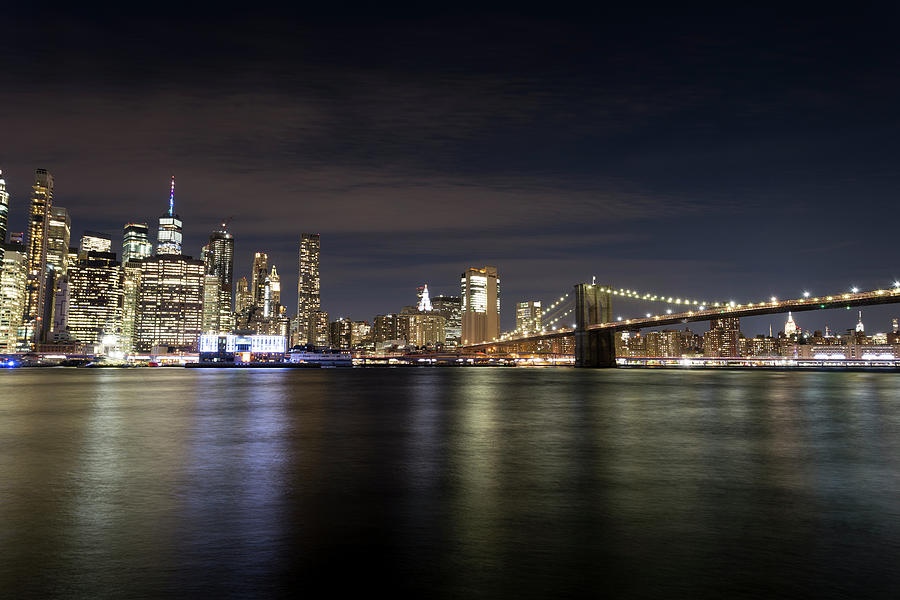 Manhattan And Brooklyn Bridge At night Photograph by David Pyatt