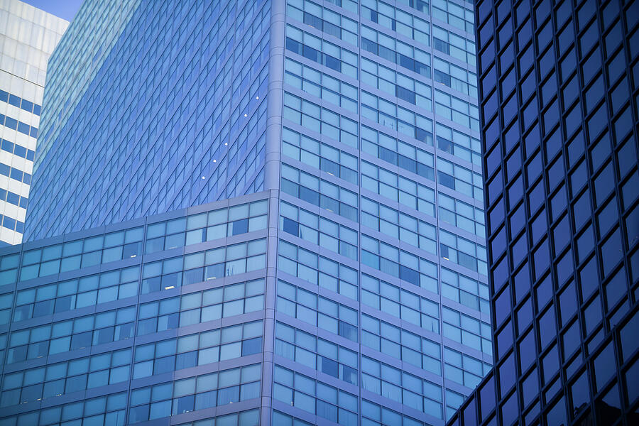 Manhattan office building glass facade Photograph by David Smith