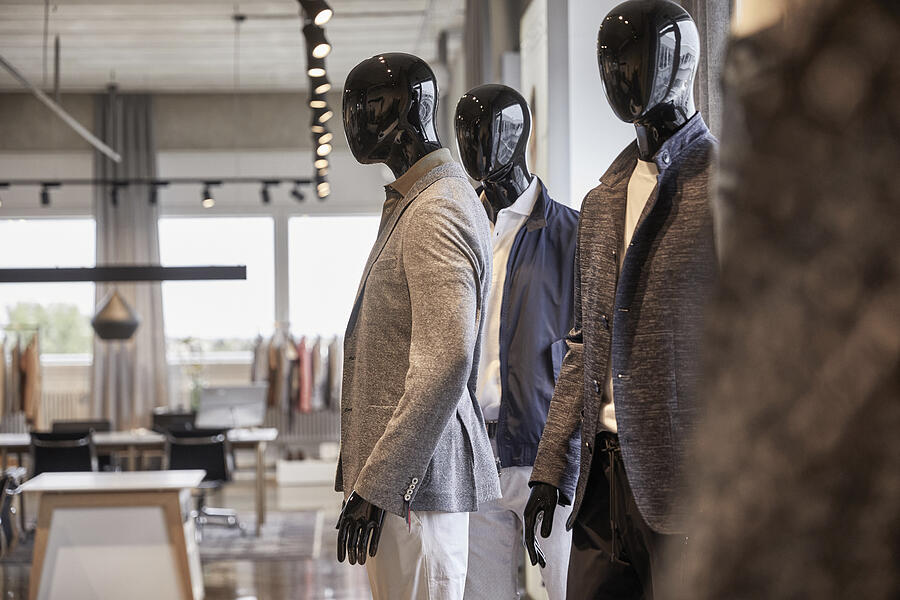 Mannequins wearing business casuals at clothing design studio Photograph by Westend61