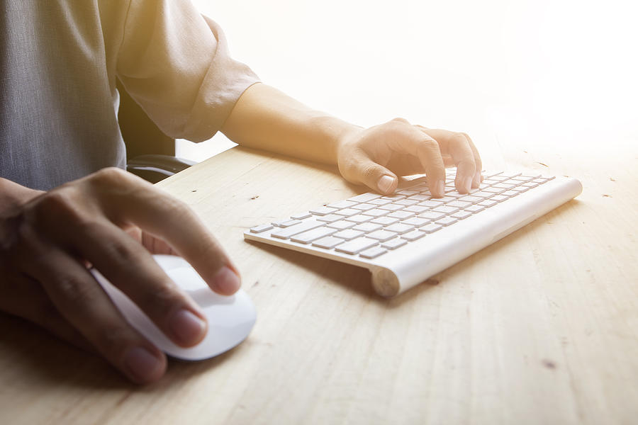 Mans Hand use mouse and typing keyboard Photograph by Skaman306