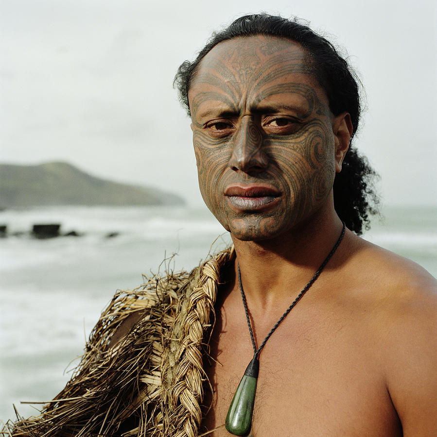 Maori warrior with Ta Moko tattoo on face, portrait Photograph by Mike Powell