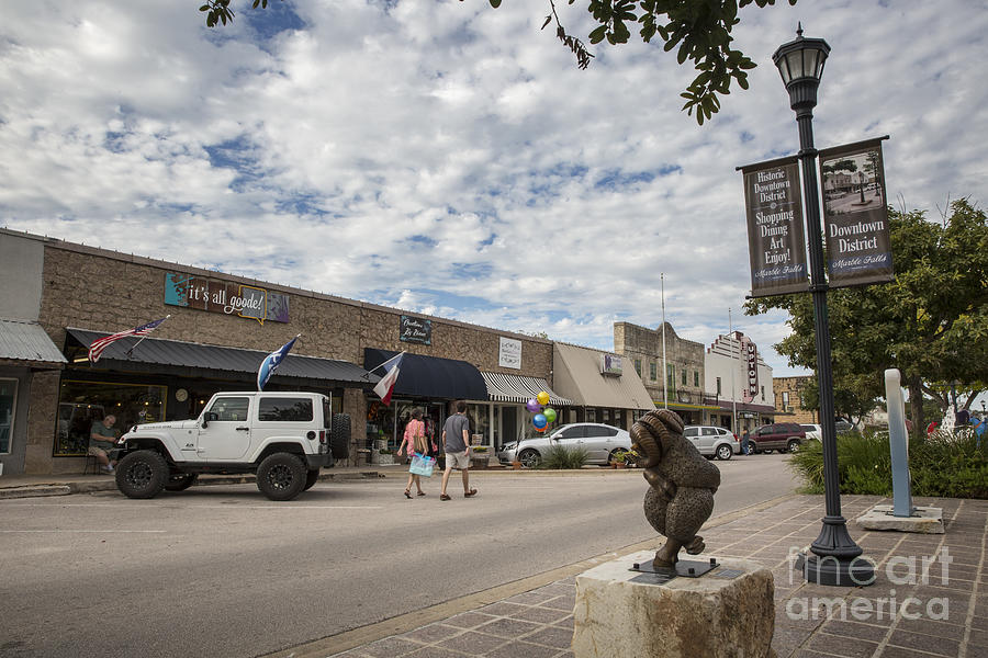 Texas Photograph - Marble Falls Historic Main Street District features shopping, restaurants, sculpture, festivals, farmers market and a theater by Dan Herron