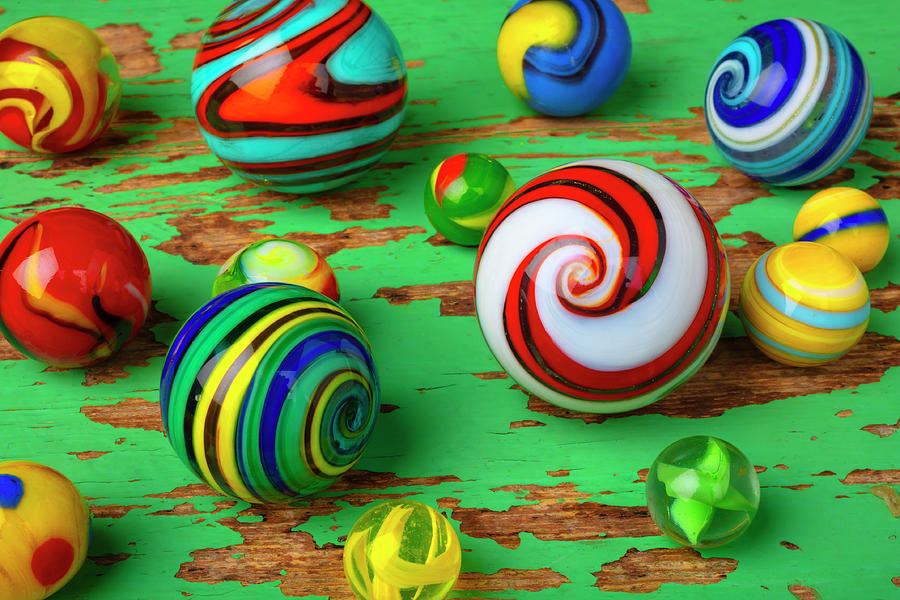 Toy Photograph - Marbles On Worn Green Table Top by Garry Gay