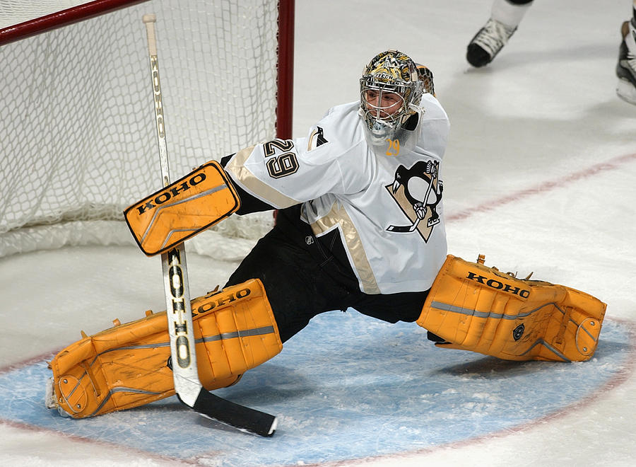Marc-Andre Fleury makes a save Photograph by Jonathan Daniel