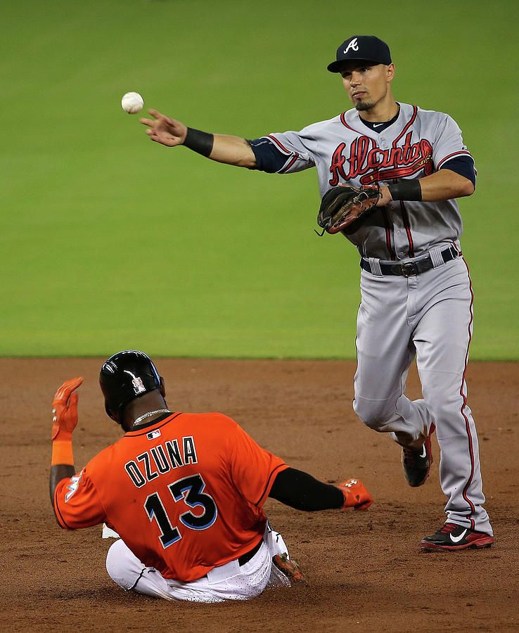 Marcell Ozuna and Jace Peterson Photograph by Mike Ehrmann Marcell Ozuna and Jace Peterson Photograph by Mike Ehrmann