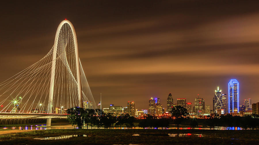Margaret Hunt Hill Bridge and Dallas Skyline at Night Photograph by HawkEye Media
