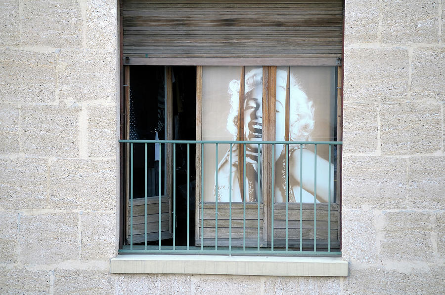 Marilyn Monroe in an apartment window, Marseille, France Photograph by Kevin Oke