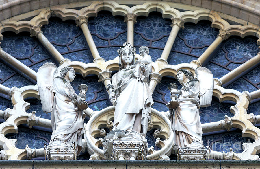 Mary and Baby Jesus on the Facade of Notre Dame de Paris in France Photograph by John Rizzuto