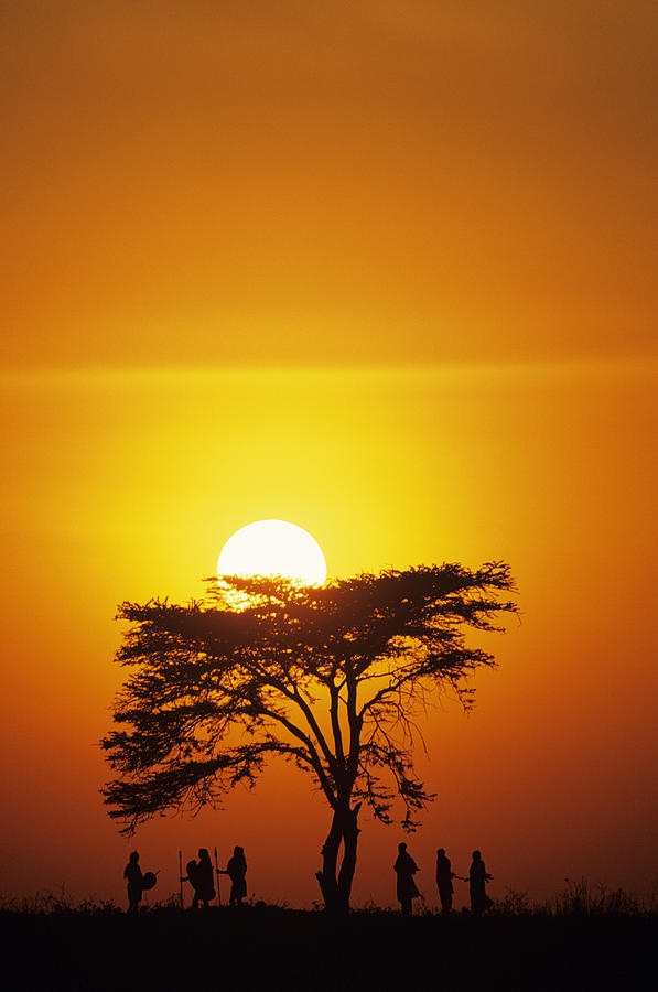Masai tribe silhouetted at dawn, Kenya Photograph by Tom Brakefield