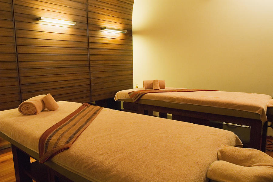 Massage tables in a spa Photograph by PhotosIndia.com