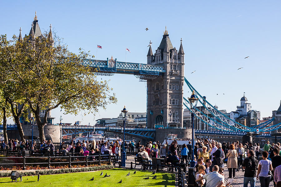 Massive crowd gathered outside Tower of London with Tower Bridge in the background Photograph by Michael Godek