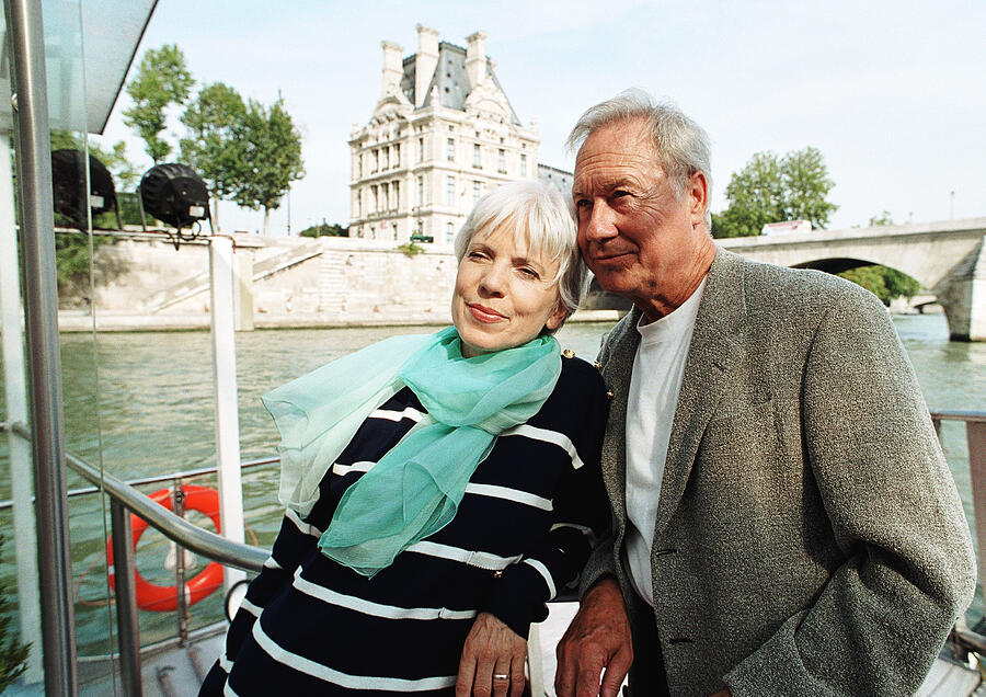 Mature man and woman on a barge Photograph by Teo Lannie