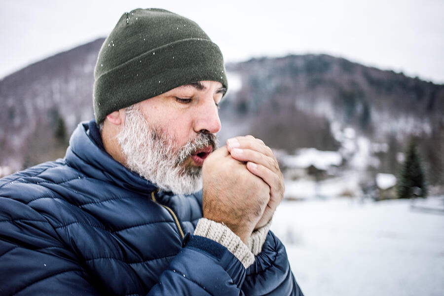 Mature Man Outdoors in Nature on a Cold Winter Day Photograph by CasarsaGuru