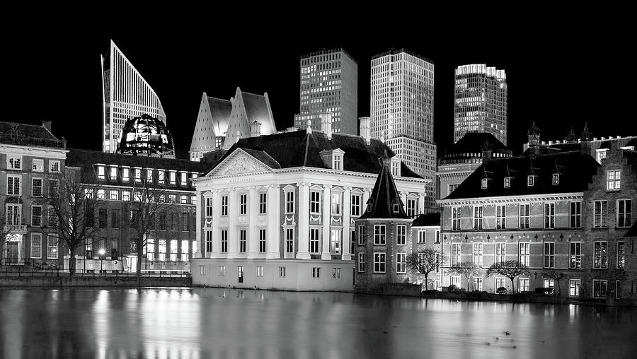 Architecture Photograph - Mauritshuis and THe Hague Skyline at Night by Barry O Carroll