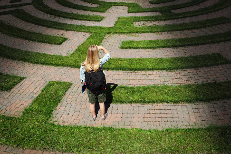 Maze Footpath with Woman Teenager Student Forecasting the Way Forward Photograph by YinYang