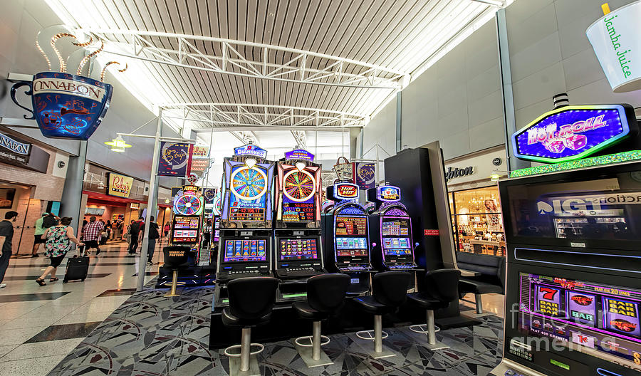 McCarran International Airport Slot Machines Inside Terminal in Las Vegas Nevada Photograph by David Oppenheimer