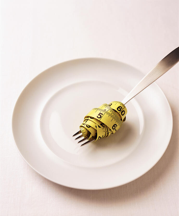 Measuring Tape Wrapped Around a Fork on a Plate Photograph by Groesbeck/Uhl