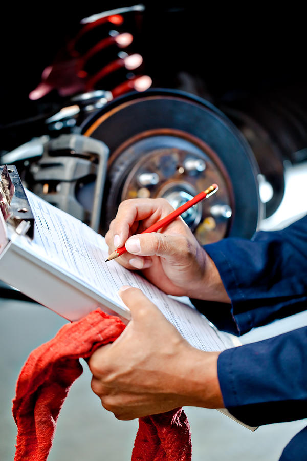 Mechanic Writing Estimate For Fix Photograph by Manley099