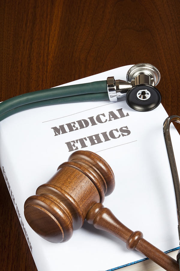 Medical ethics Photograph by Ericsphotography