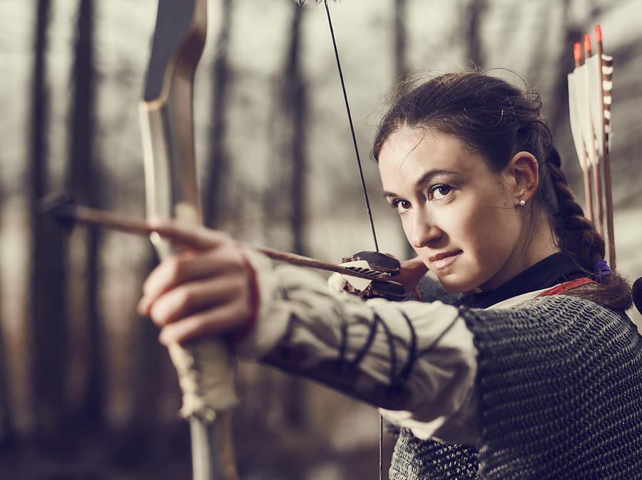 Medieval archery, woman shoot Photograph by Jarih