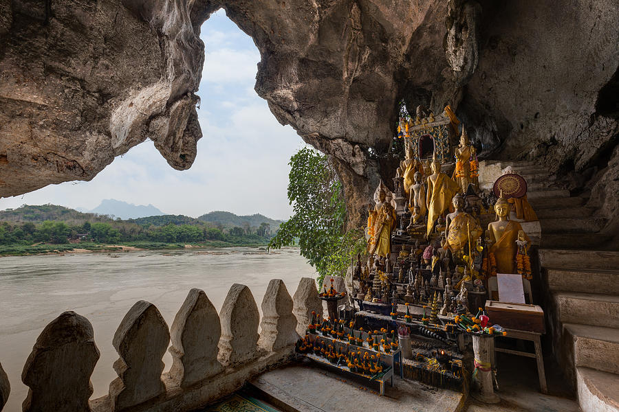 Mekong River and Pak Ou Caves in Laos Photograph by Tuomas Lehtinen