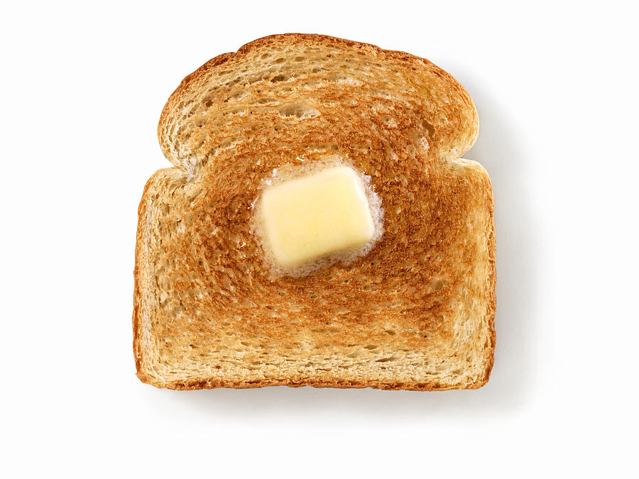 Melting Butter on White Toast Photograph by LauriPatterson