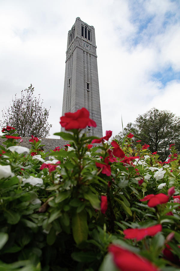 Memorial Bell Tower With Flowers At North Carolina State University Photograph