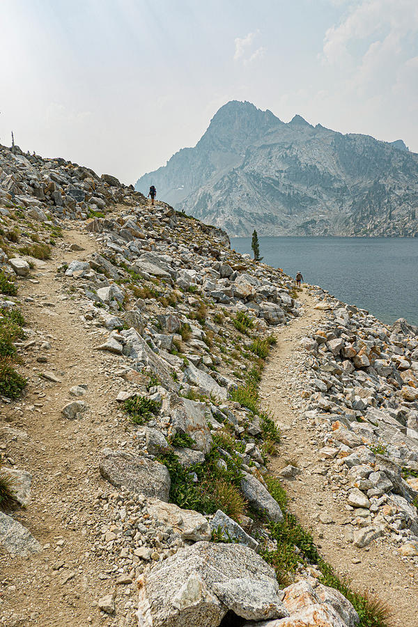 Men hiking on trail 478 along the East shore of Sawtooth Lake Photograph by David L Moore