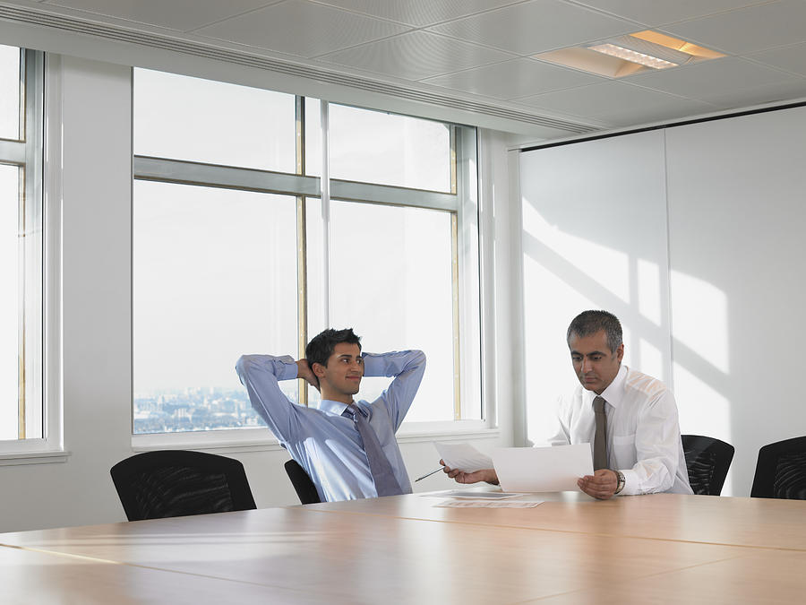 Men in meeting room Photograph by Image Source