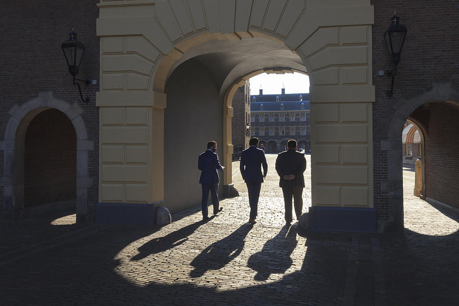 men on Binnenhof in The Hague Photograph by Gaps