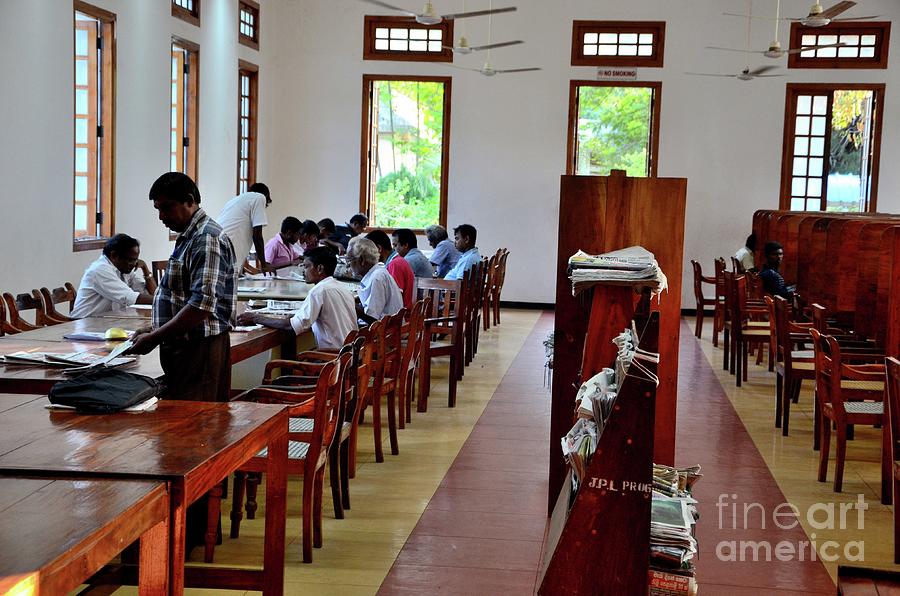 Men read journals newspapers in male reading room Jaffna Public Library Jaffna Sri Lanka Photograph by Imran Ahmed