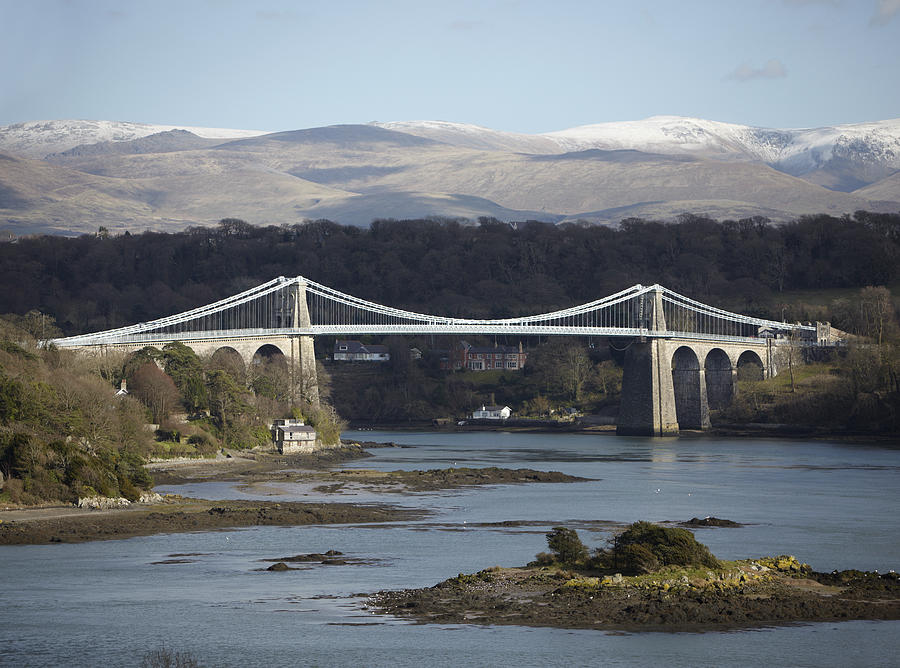 Menai Bridge, Anglesey, with Snowdonia, North Wales Photograph by Elgol