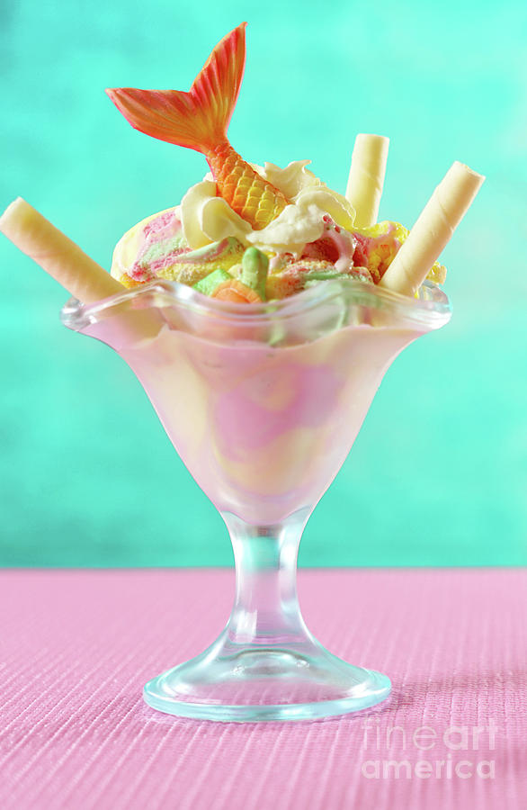 Mermaid sea theme rainbow ice cream sundaes on bright colorful background. Photograph by Milleflore Images