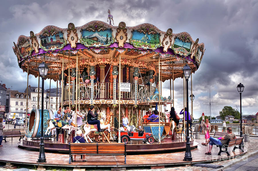 Merry-go-round in Honfleur - France Photograph by Paolo Signorini