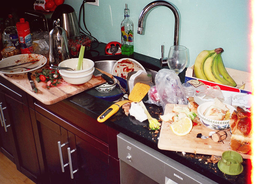 Messy kitchen after huge dinner party Photograph by Levi Mandel