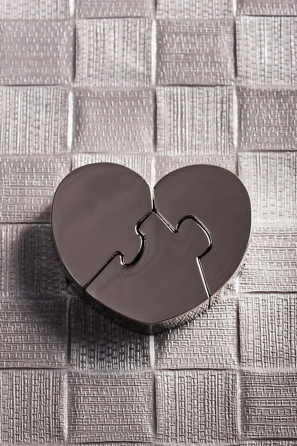 Metal puzzle of heart Photograph by Tooga