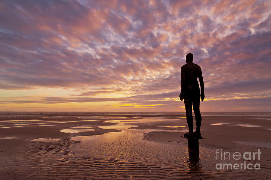 Metal statues on Crosby beach, Merseyside, England Photograph by Neale And Judith Clark