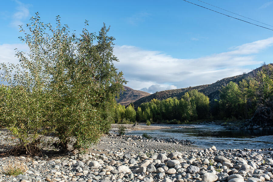 Serene Riverbank Landscape Photograph - Methow River Rocks and Early Autumn Sky by Tom Cochran