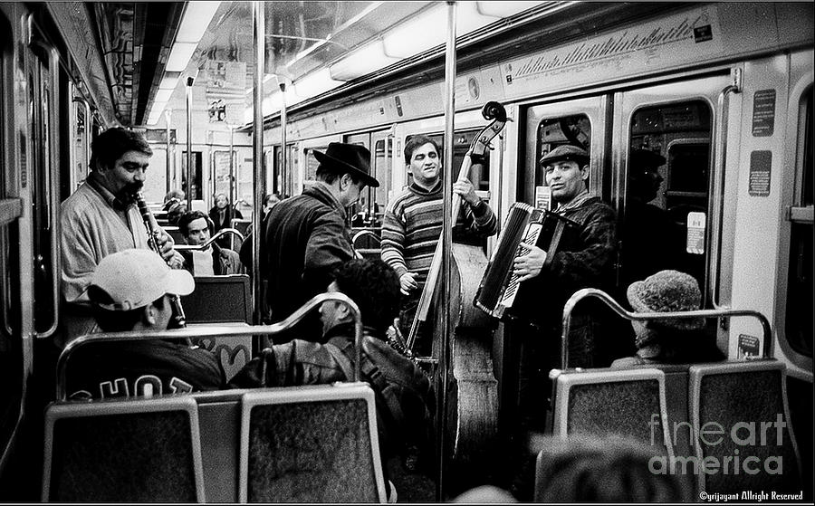 Metro Parisian  and the rail entertainment Photograph by Cyril Jayant