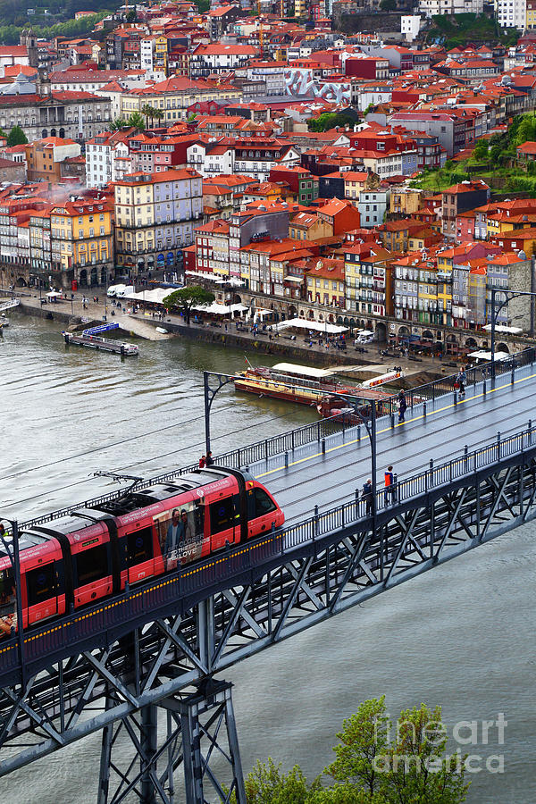 Bridge Photograph - Metro train crossing the River Douro Oporto Portugal by James Brunker
