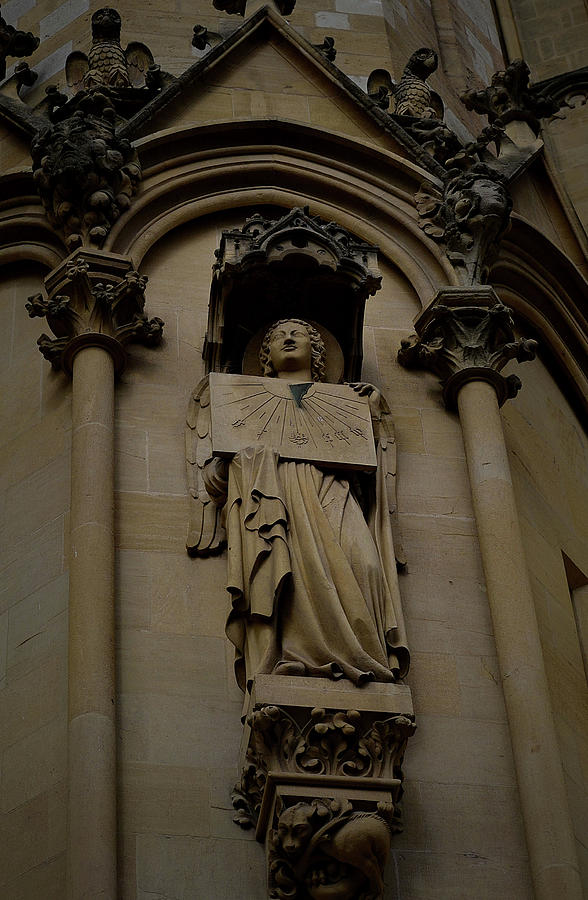 Metz Cathedral Angel with Sun Dial Photograph by Nadalyn Larsen