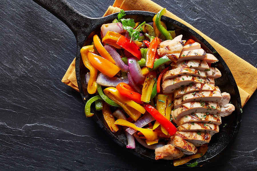 Mexican Grilled Chicken Fajitas In Iron Skillet Photograph by Rez-art