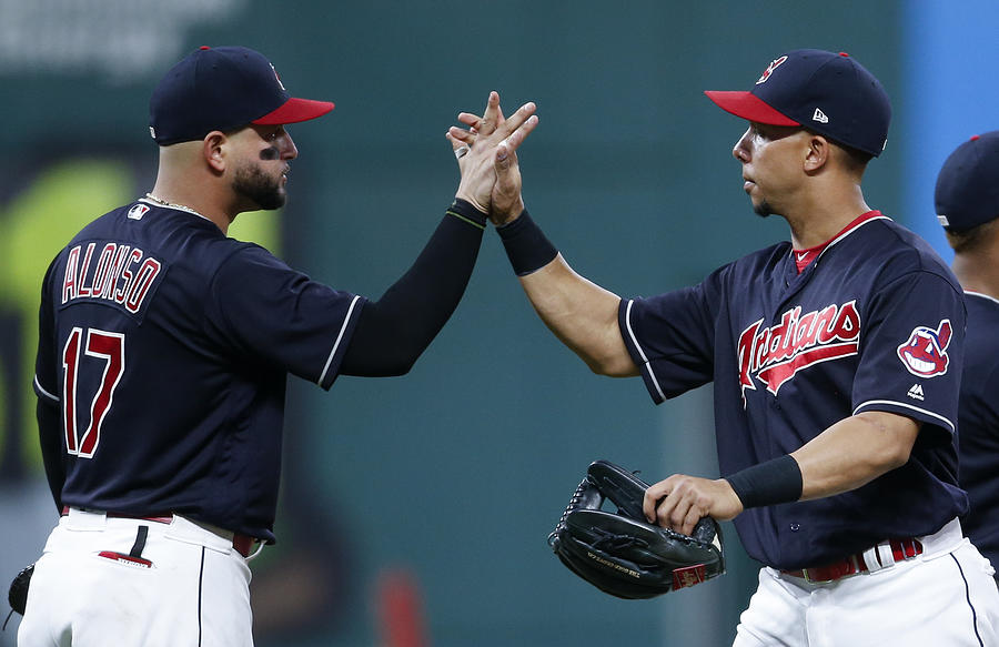 Michael Brantley and Yonder Alonso Photograph by Ron Schwane