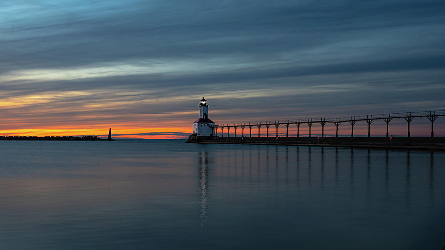 Michigan City Lighthouse at dusk Photograph by Travel Quest Photography