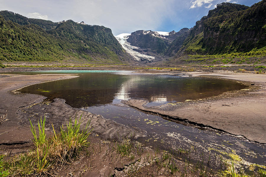 Michinmahuida glacier with pond reflexion Photograph by Henri Leduc