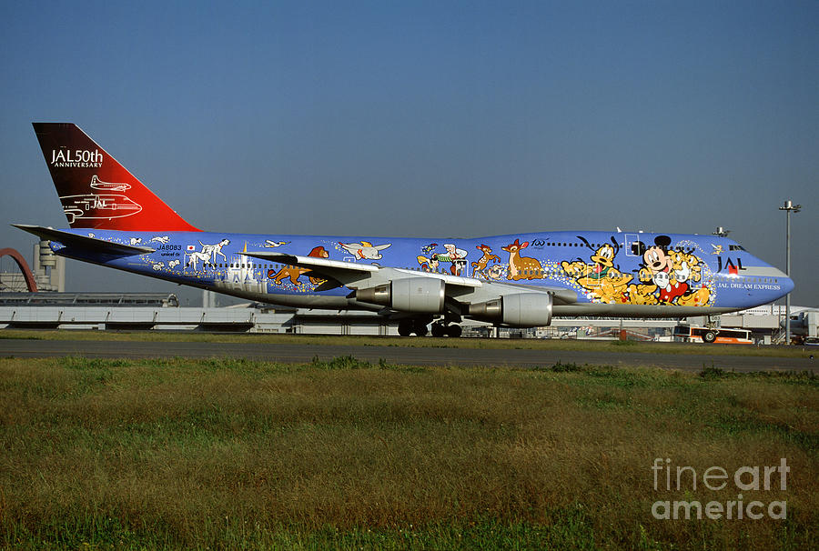 Mickey Mouse Cartoon Character on a 747, Boeing 747-446D, JA8083 by Wernher  Krutein