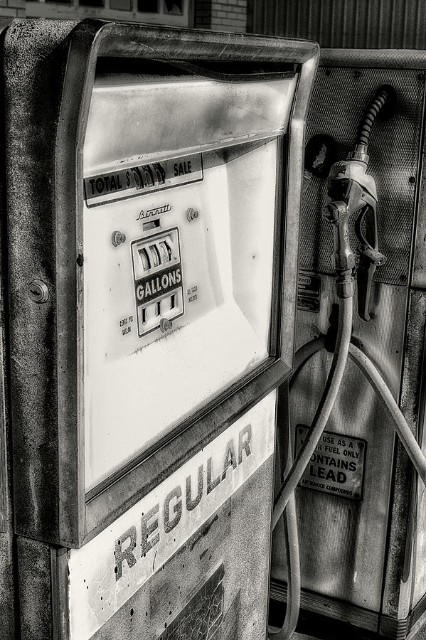 Mid Century Rusted Gas Pump Detail black and white photograph Photograph by Ann Powell